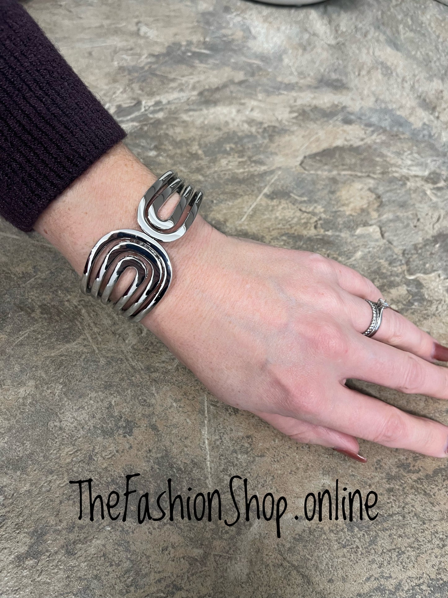 Silver swirl statement bangle