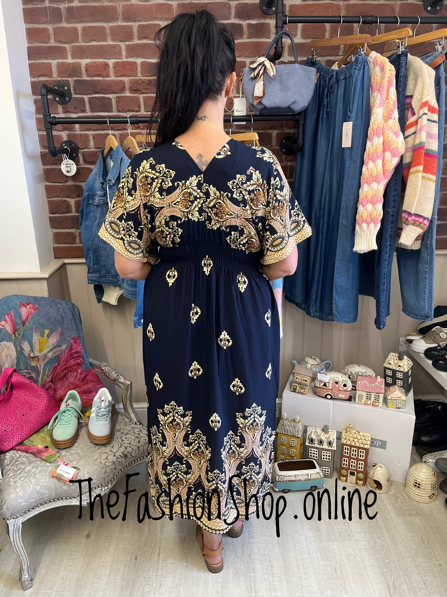 Maria navy and gold dress sizes 10-12, 14-16 and 18