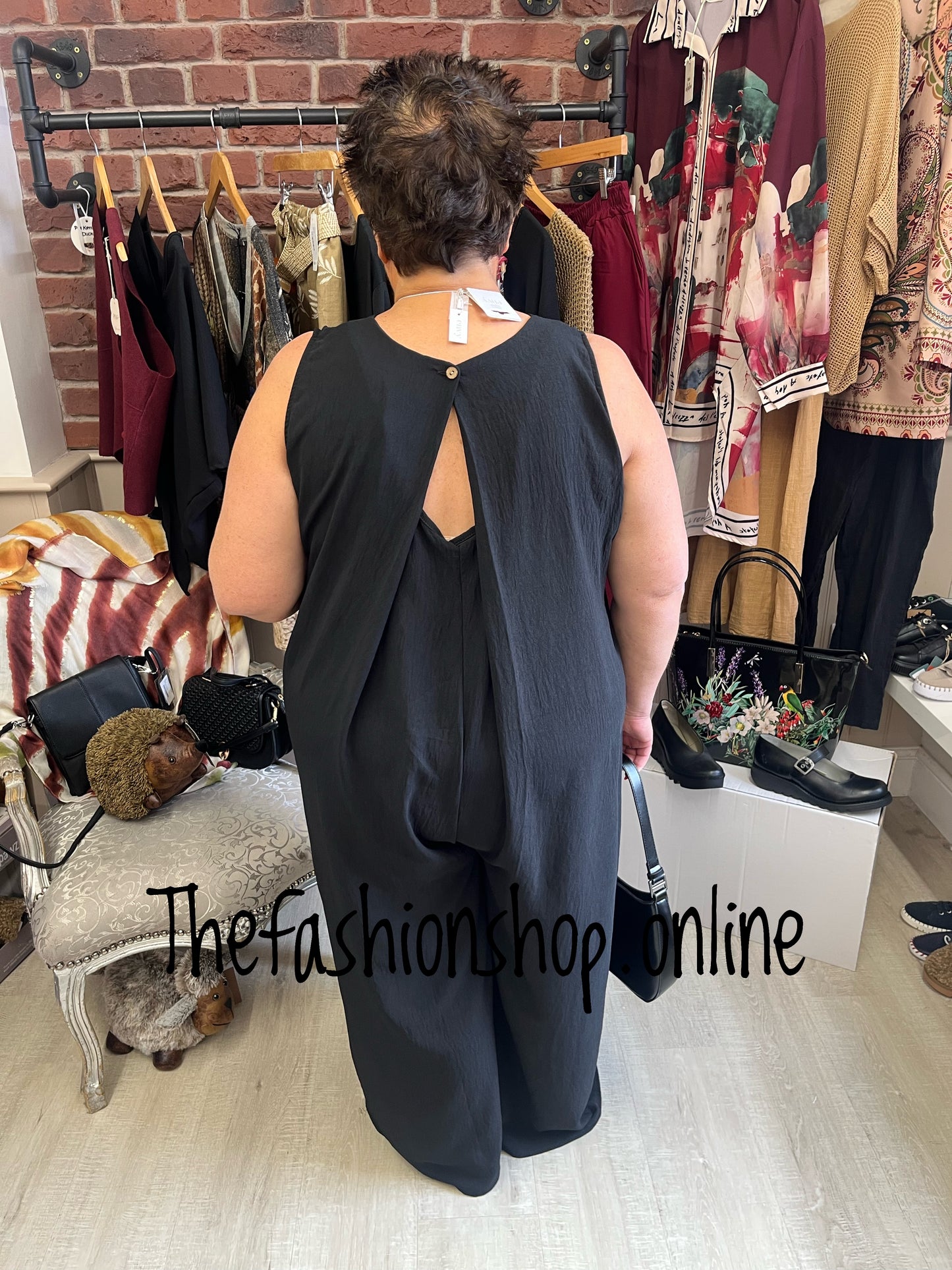Paris black v neck jumpsuit with back detail 16-20