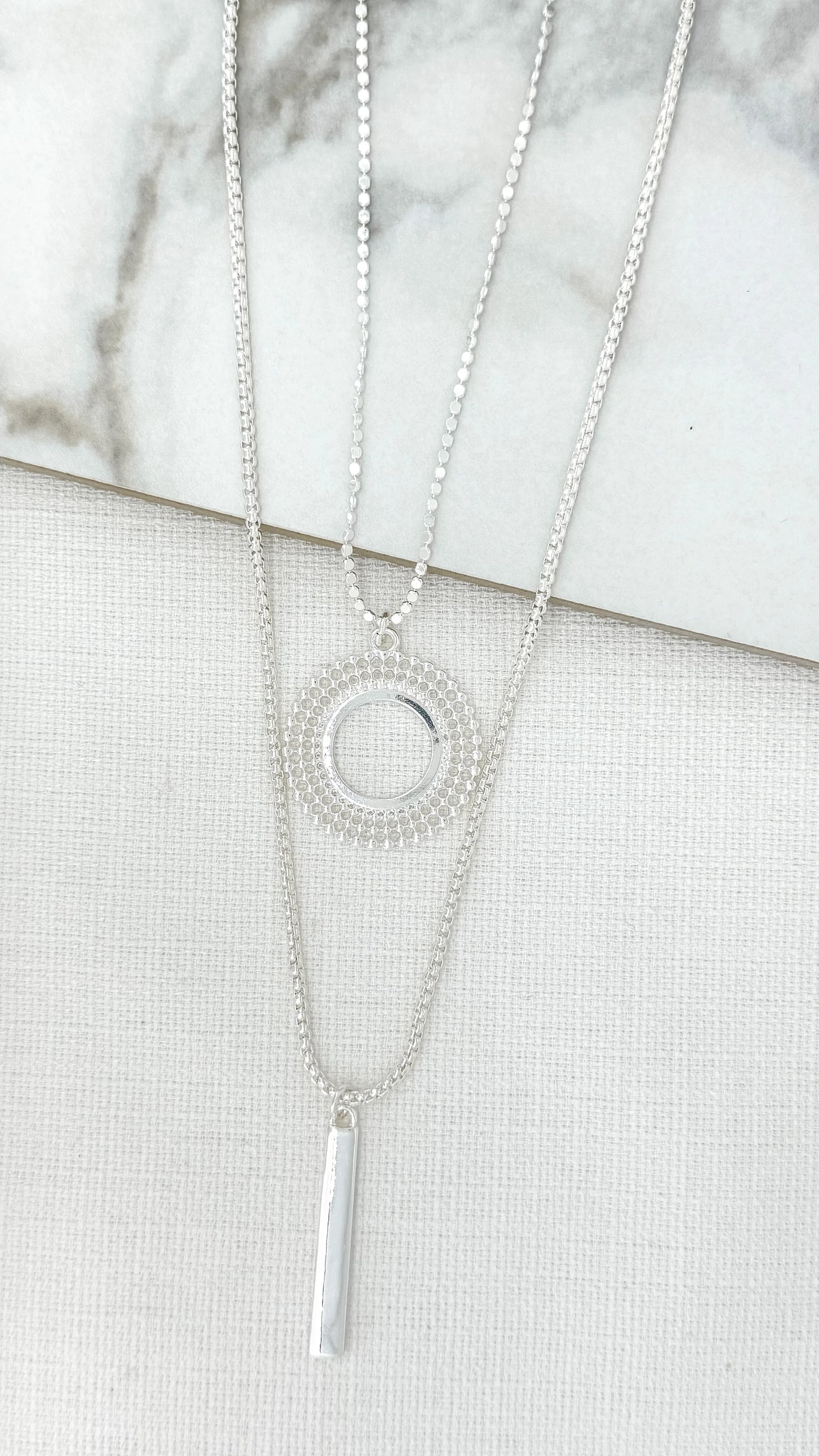 Envy double layer silver necklace with circle and bar pendants