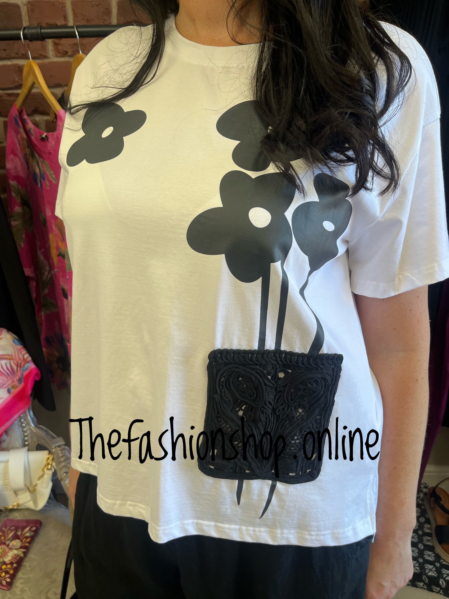 Fly Out white and black flower top 10-16