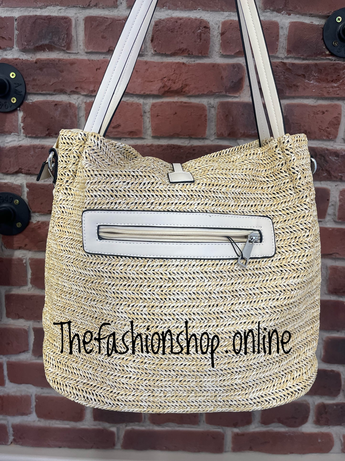 Natural woven straw bag with tassel