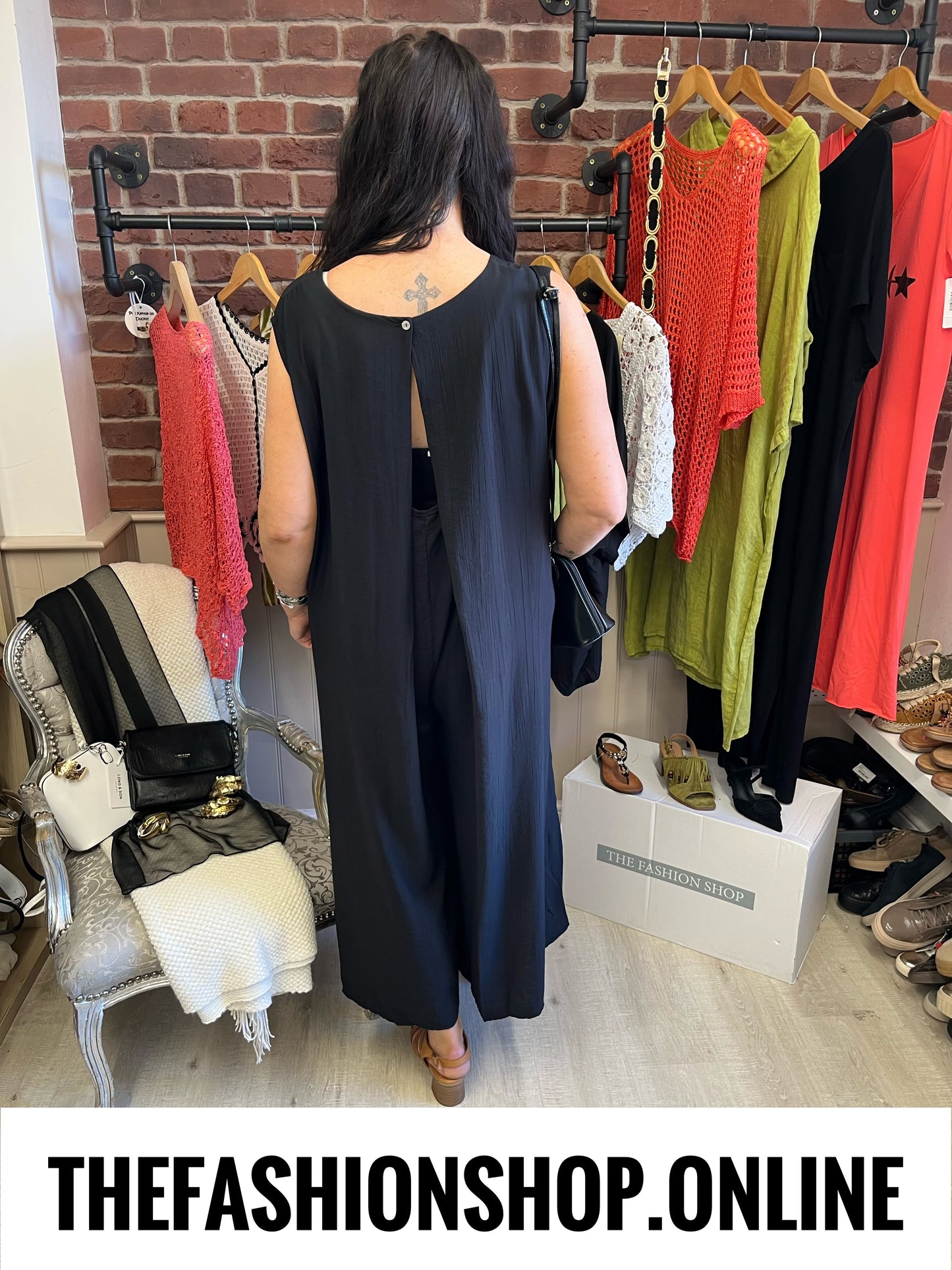 Katelyn black open back jumpsuit 12-18
