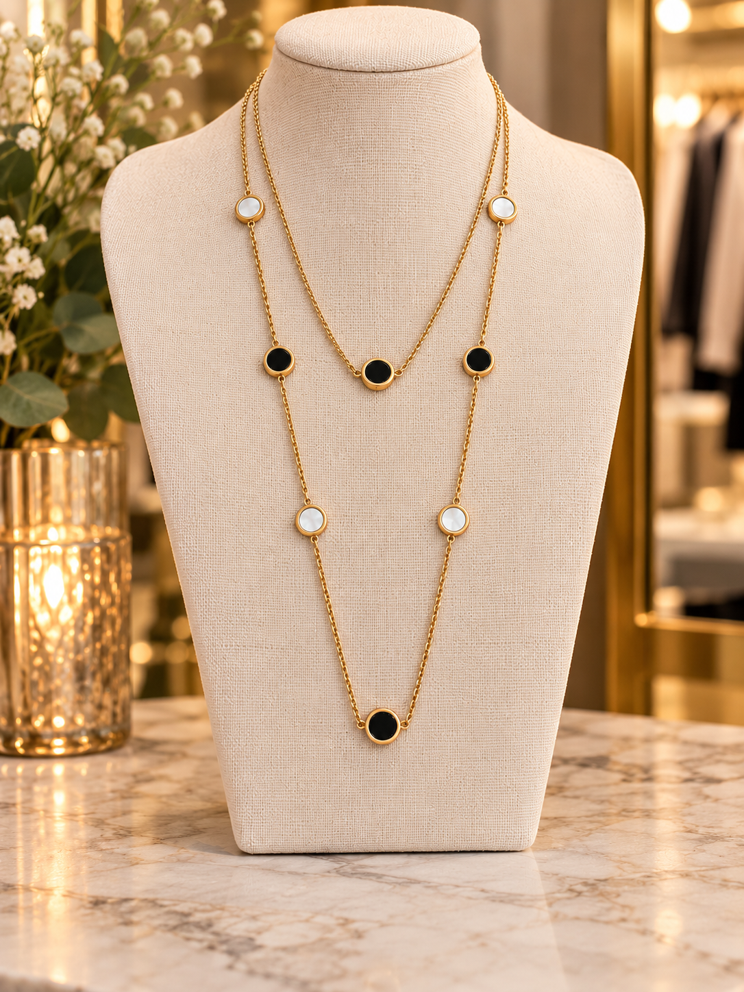 Envy double layer gold necklace with black & white circles
