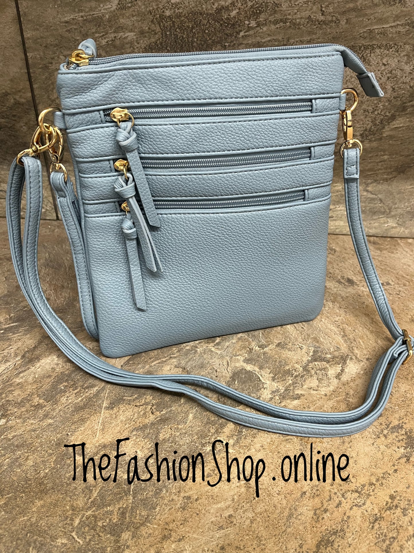 Maxine blue multi pocket messenger bag