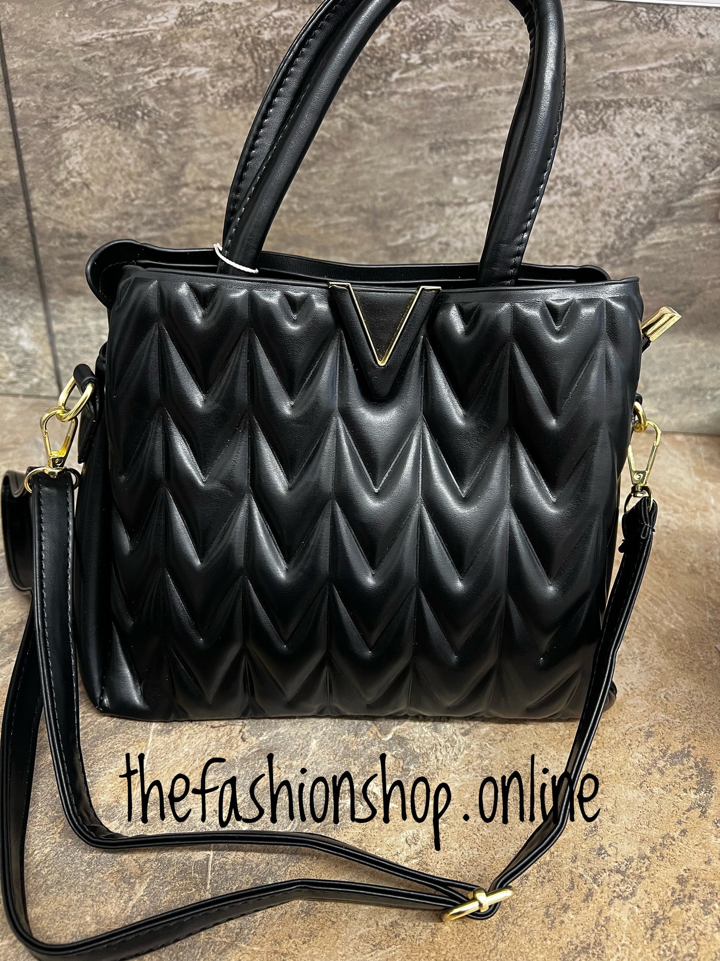 Black padded chevron bag