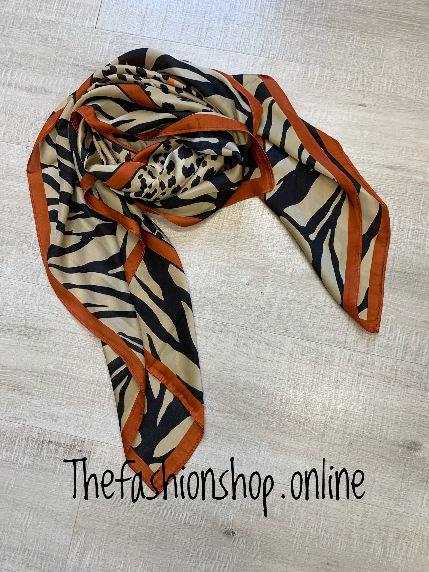 Rust and beige animal print silky square scarf