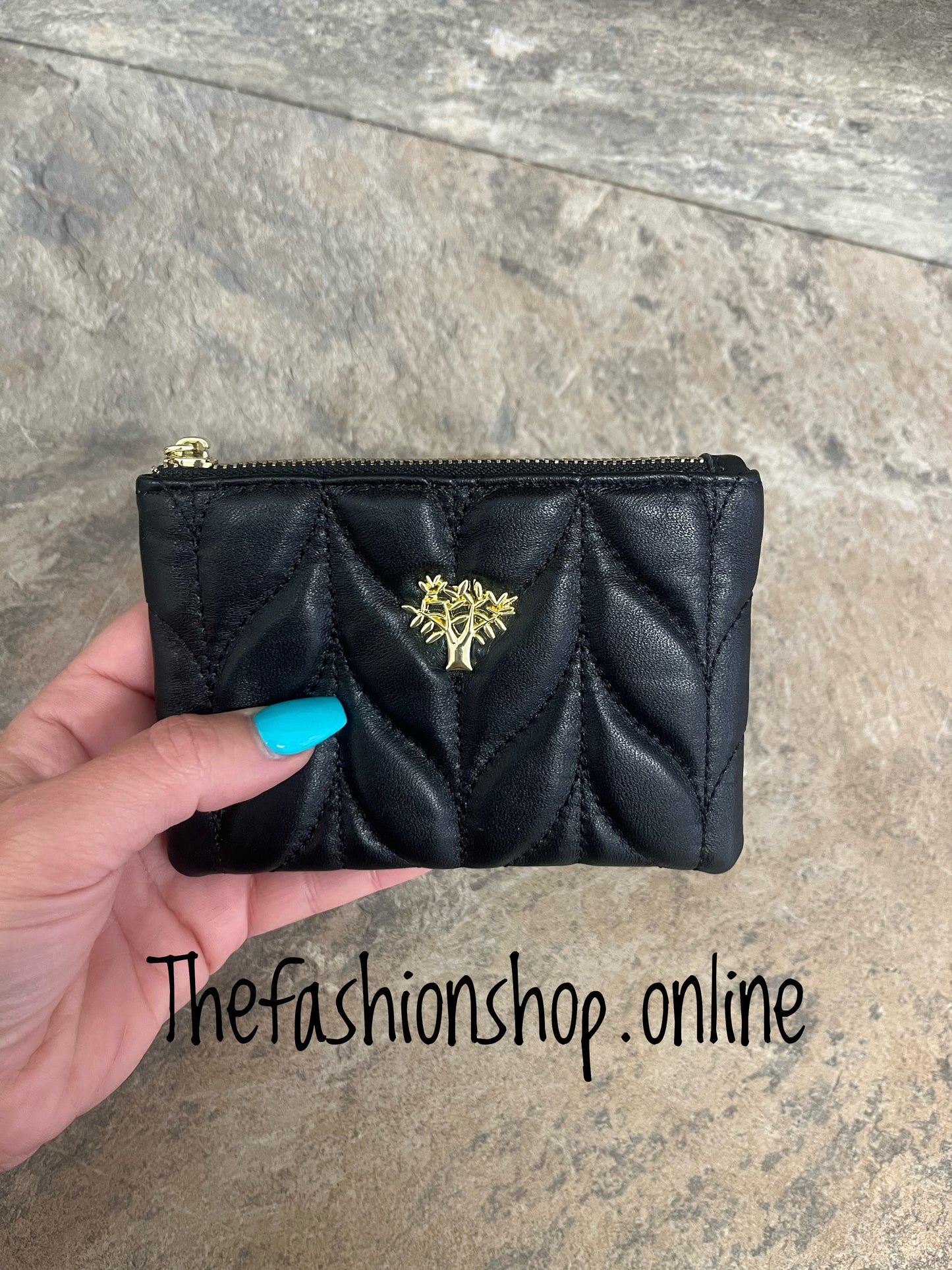 Black leather quilted purse