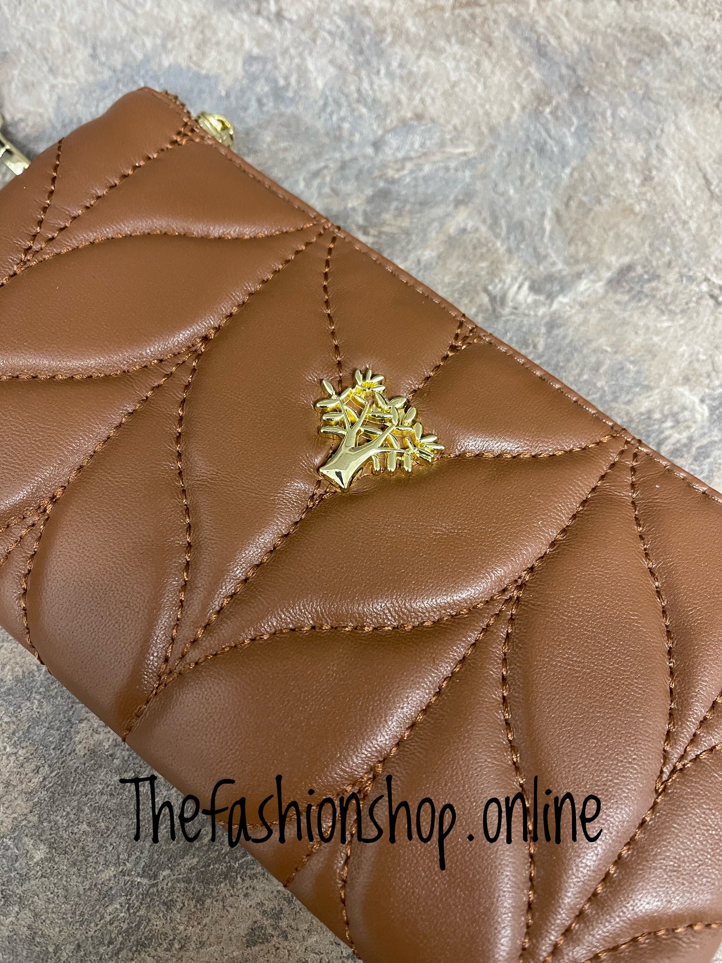 Tan leather quilted wristlet