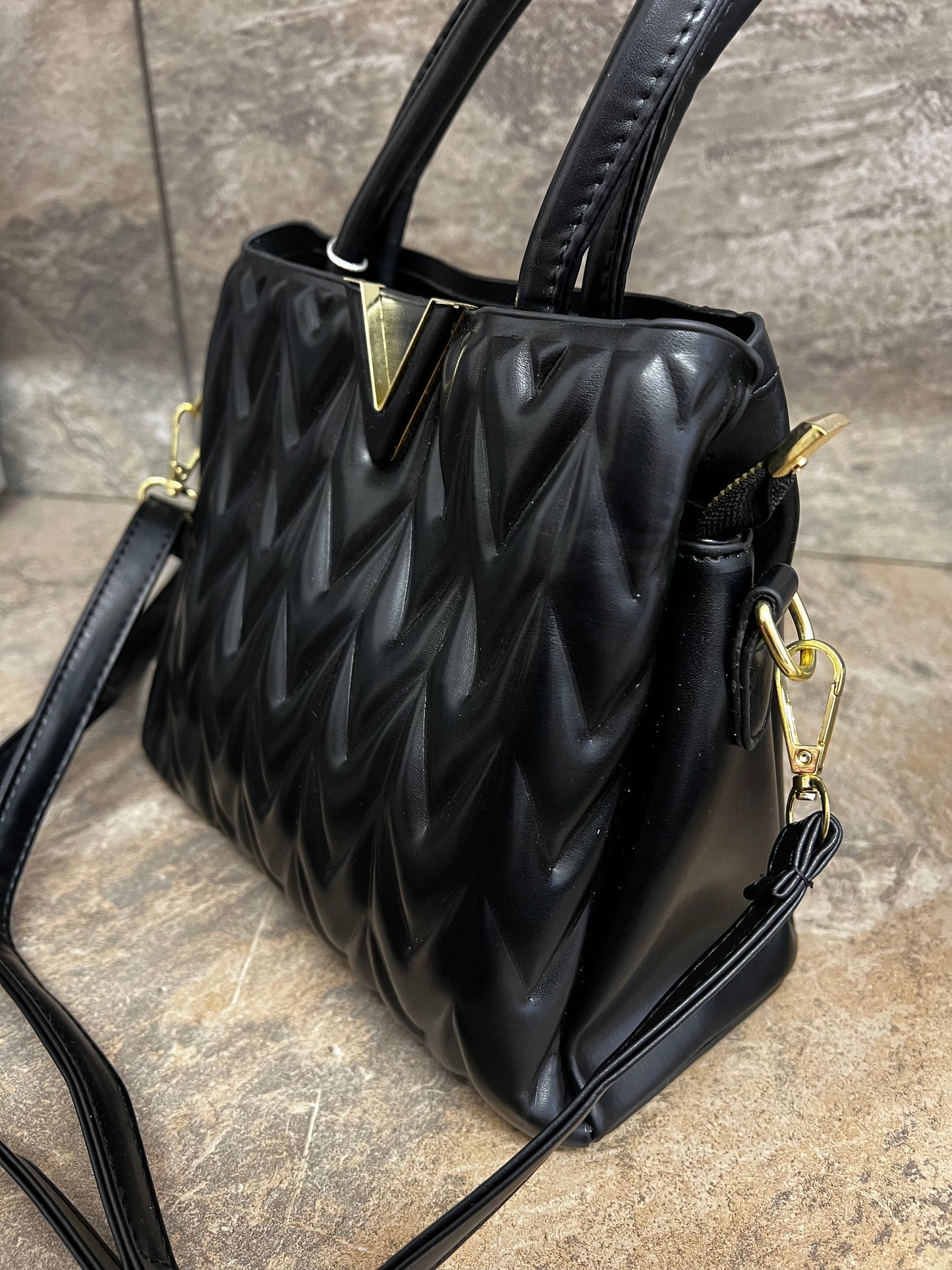 Black padded chevron bag