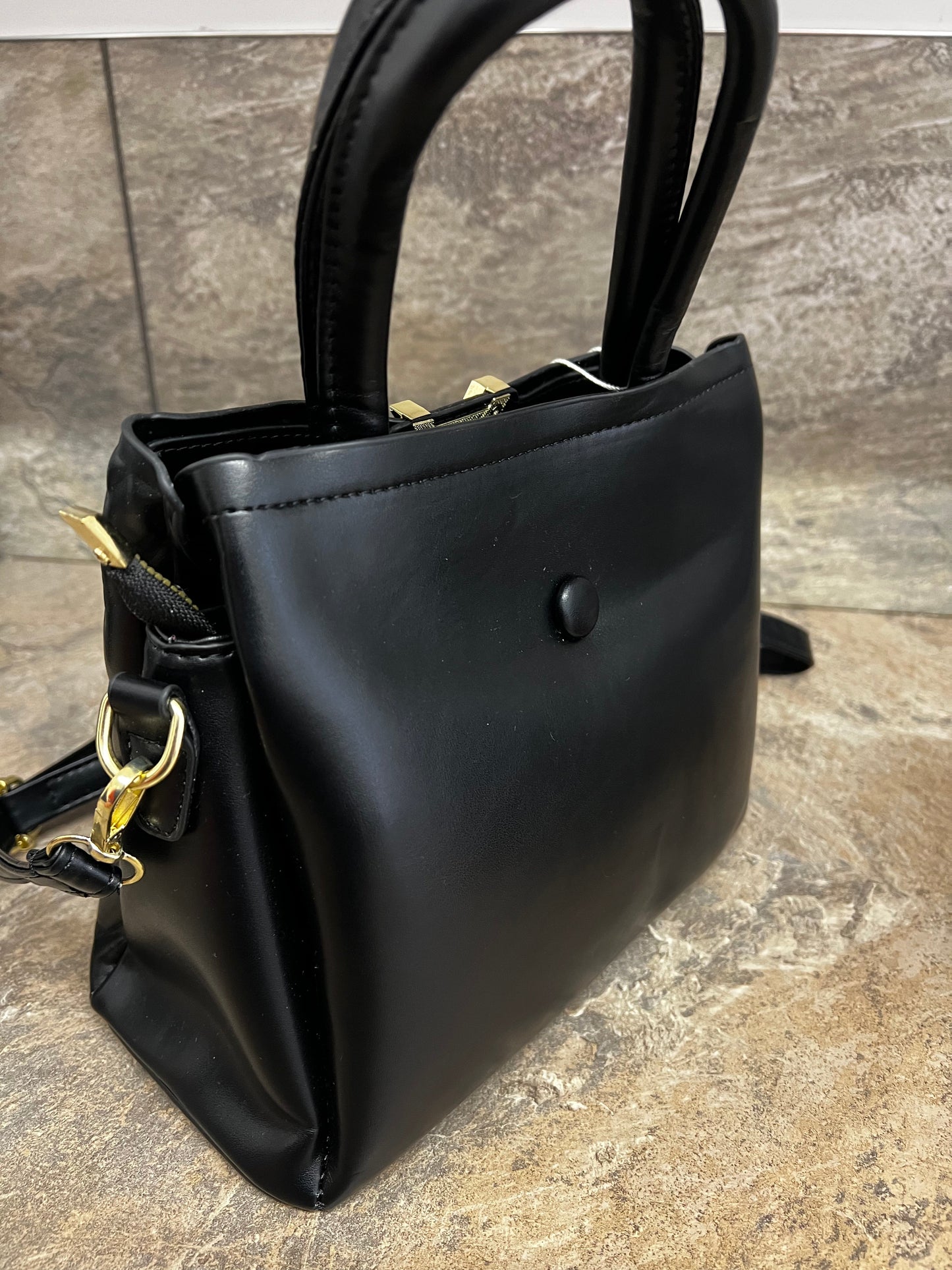 Black padded chevron bag