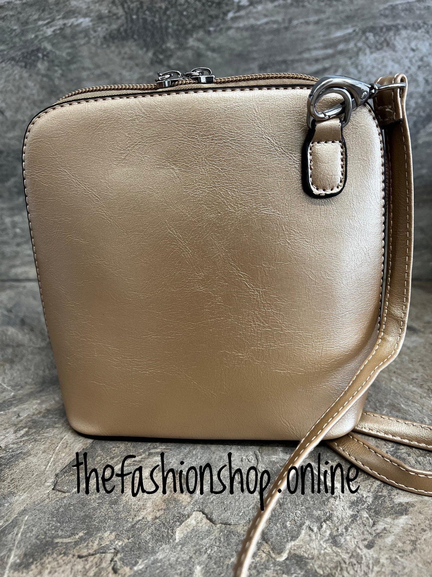 Gold chic bag with long shoulder strap
