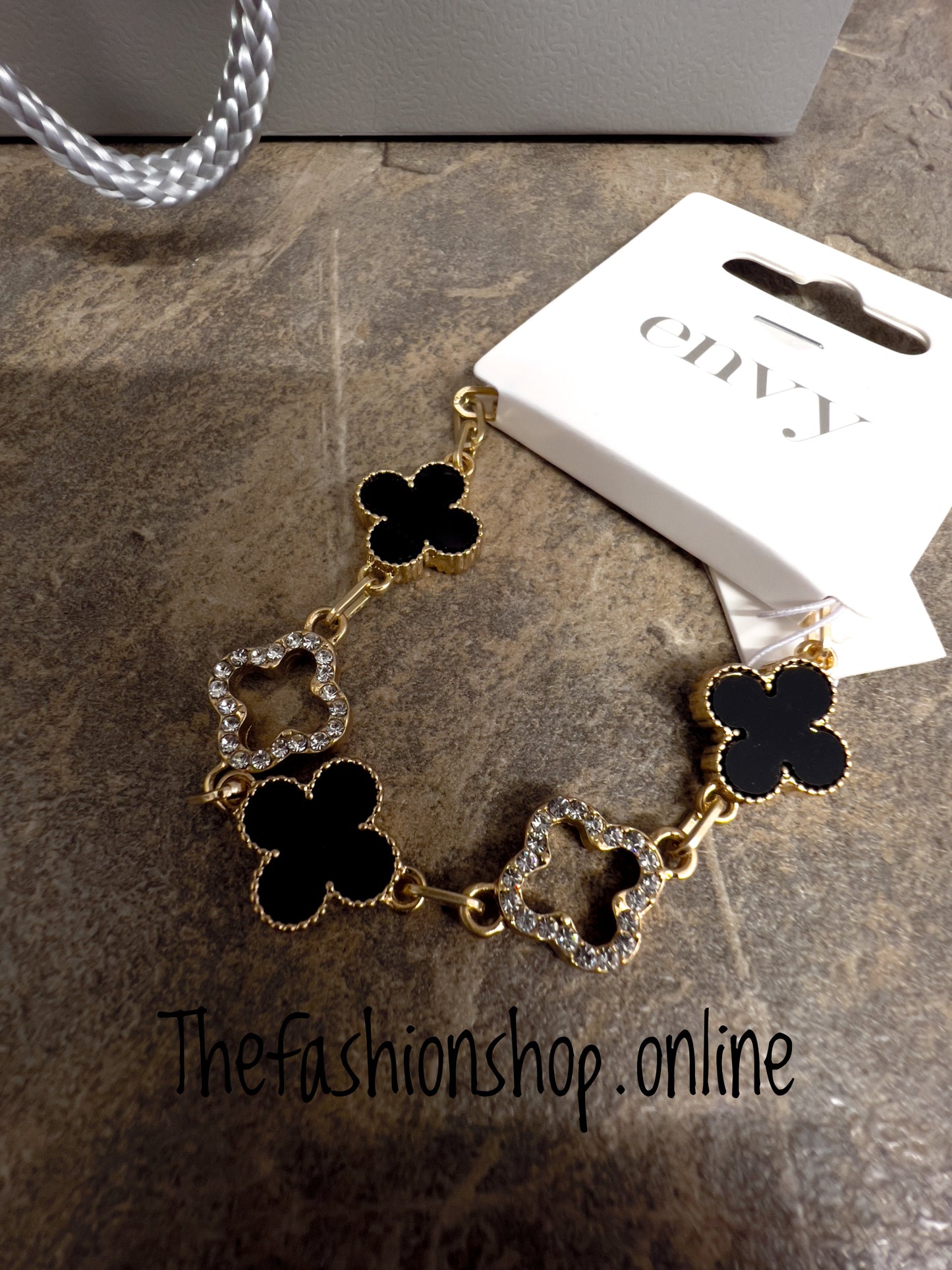 Envy black and gold sparkle clover bracelet