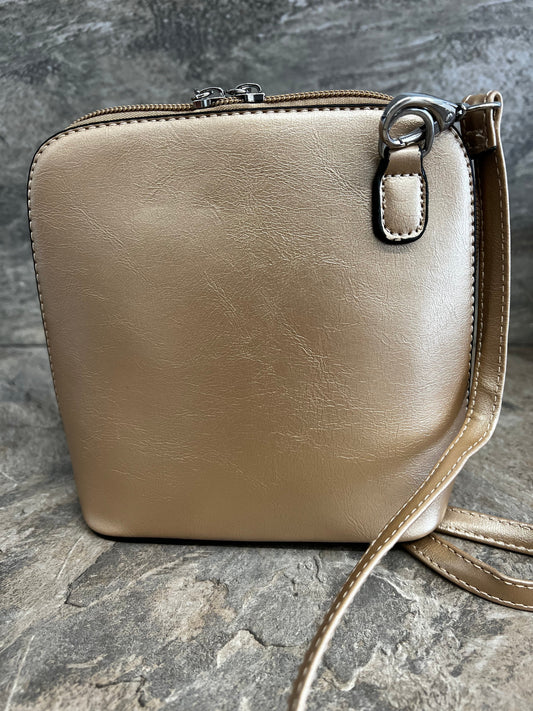 Gold chic bag with long shoulder strap