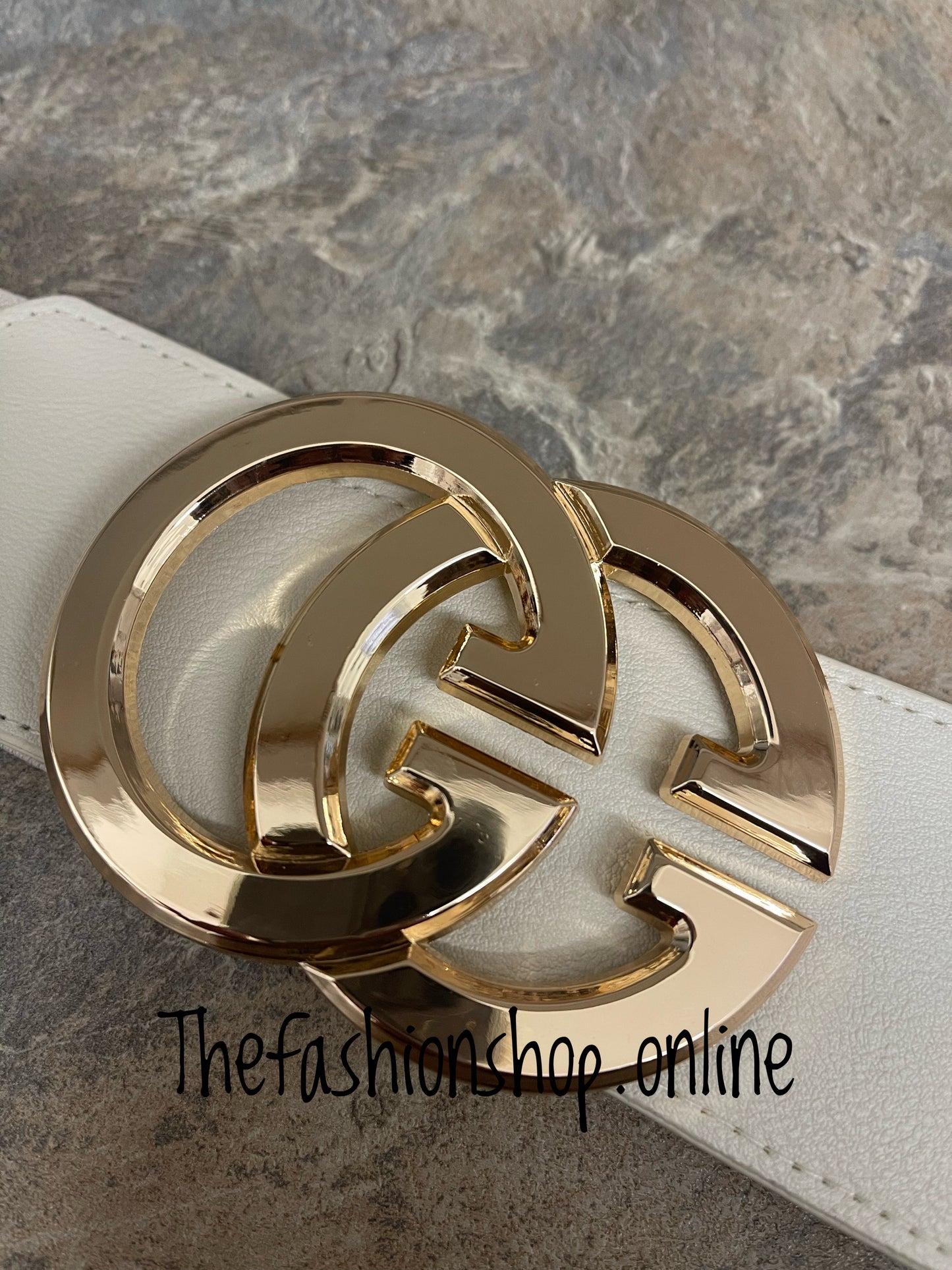 Stone elasticated belt with gold logo buckle