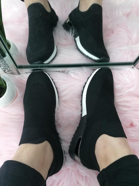 Black mesh slip on trainers