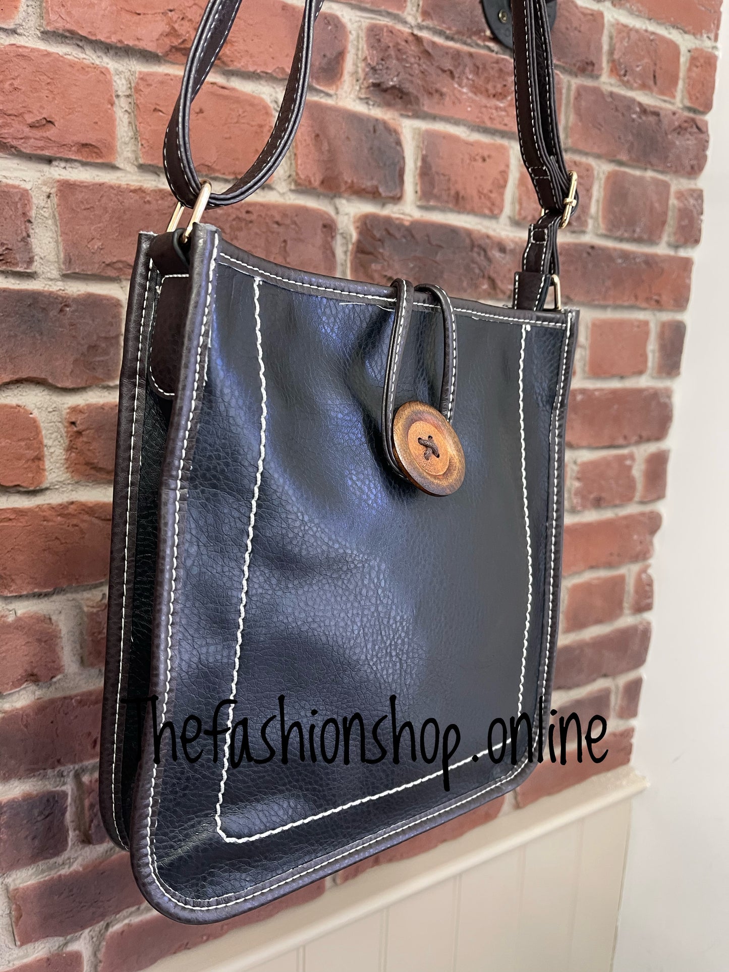 Lexi Shoulder Bag With Button and Stitch Detail in Black