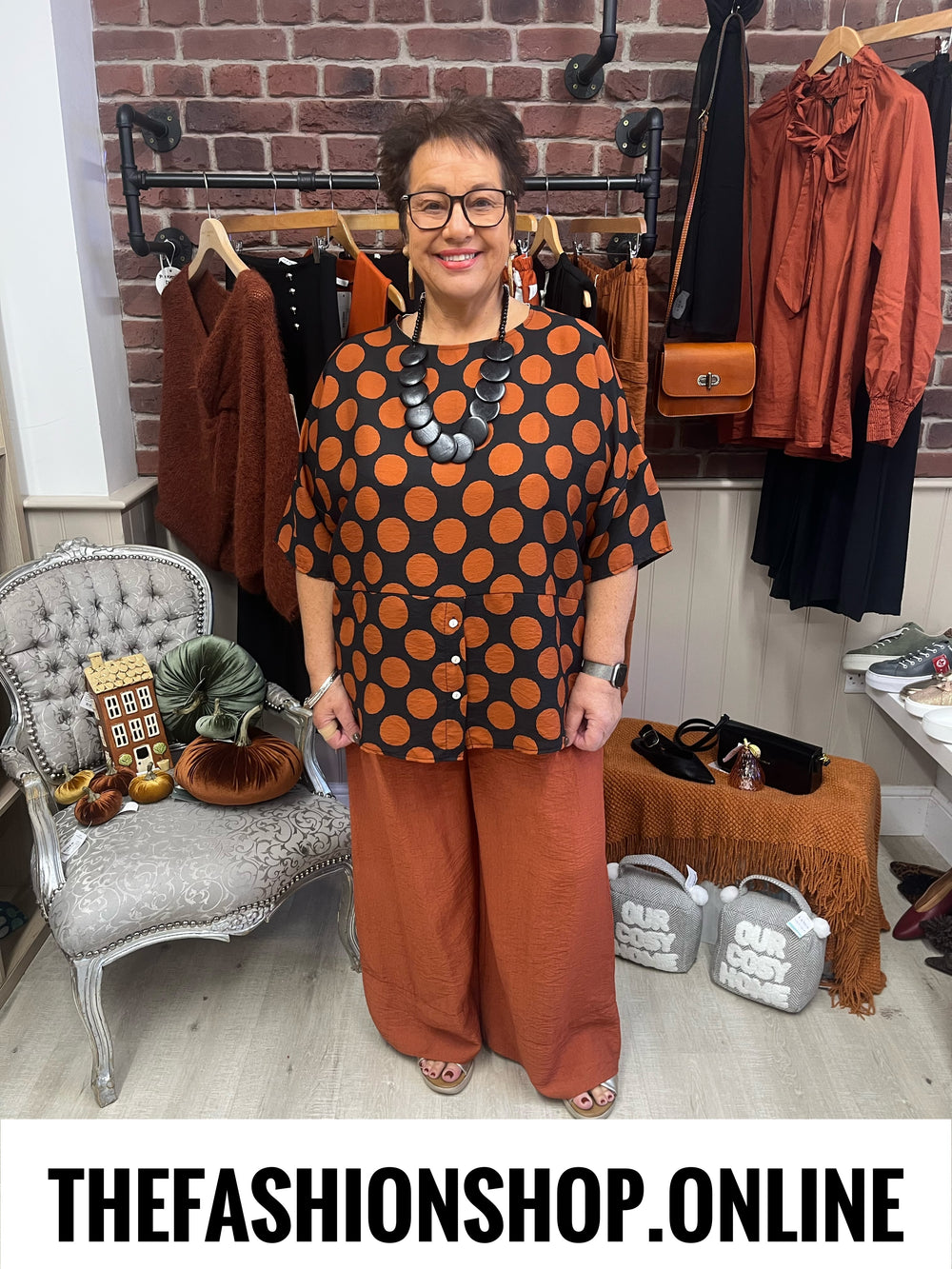 Nancy black and cinnamon spot button top 14-20
