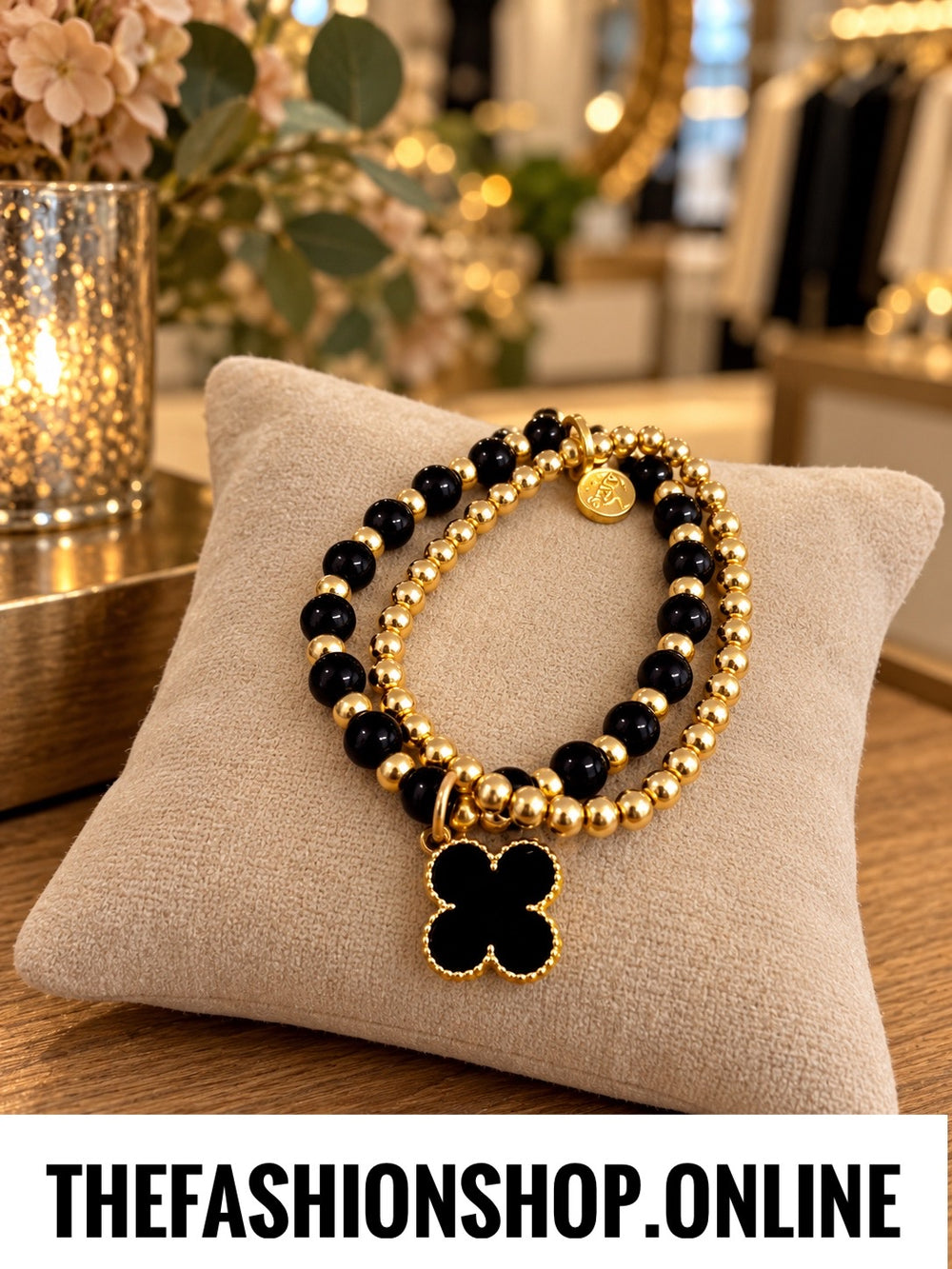 Envy layered clover bracelet in black and gold