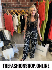 Luna black and white giraffe print trousers 14-20
