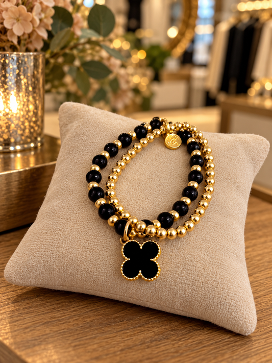 Envy layered clover bracelet in black and gold