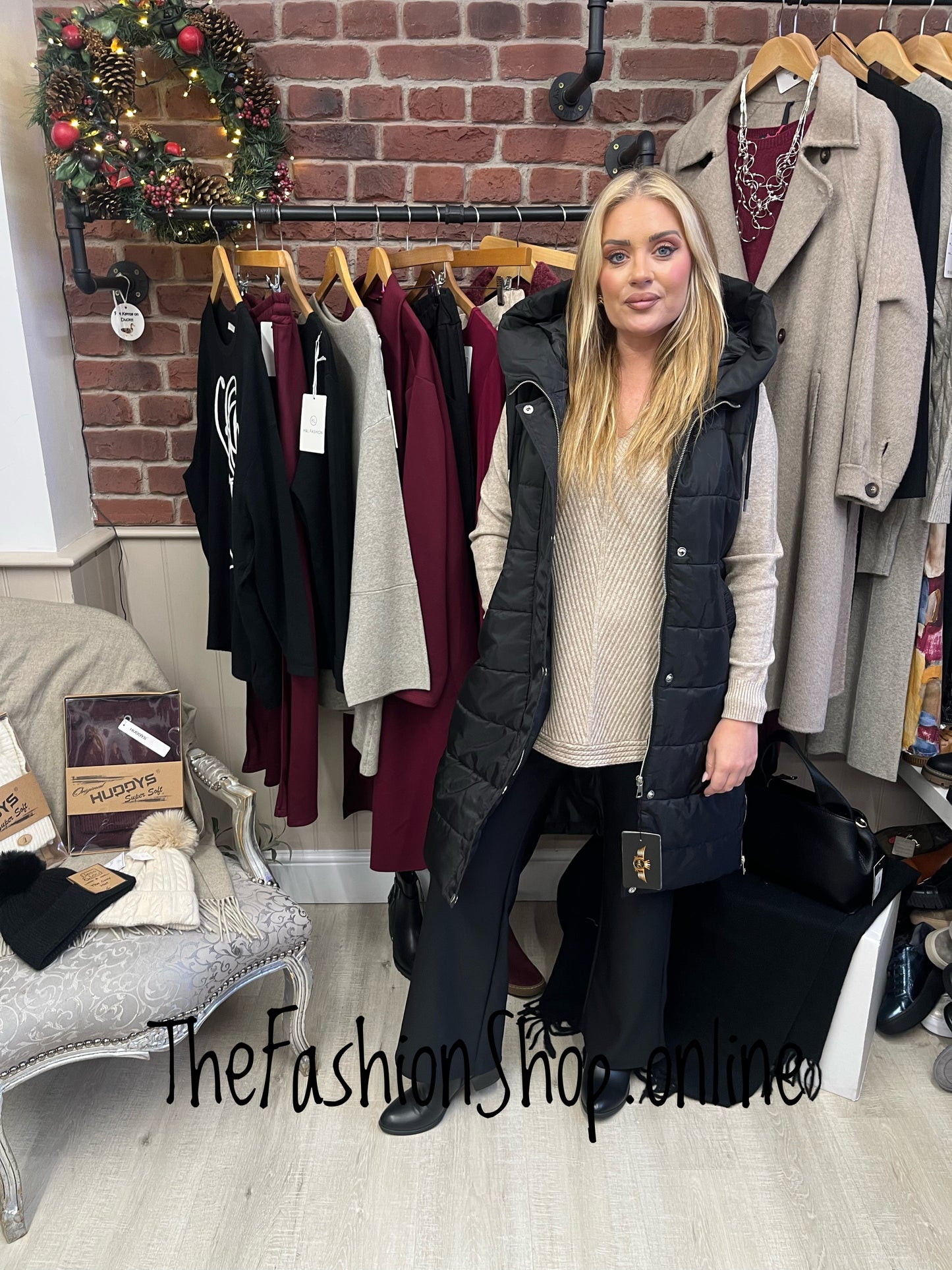 Black longline padded gilet in sizes 8 to 18