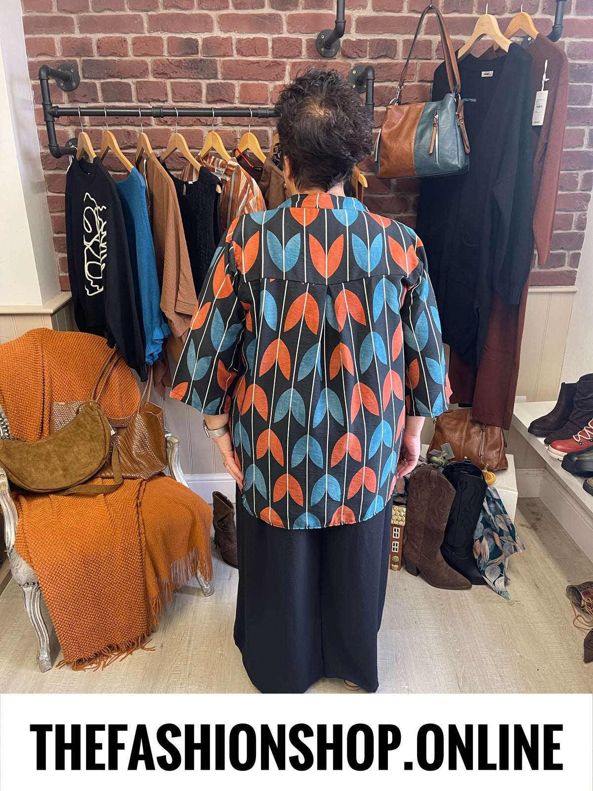 Lorena teal and tan print tunic 14-20