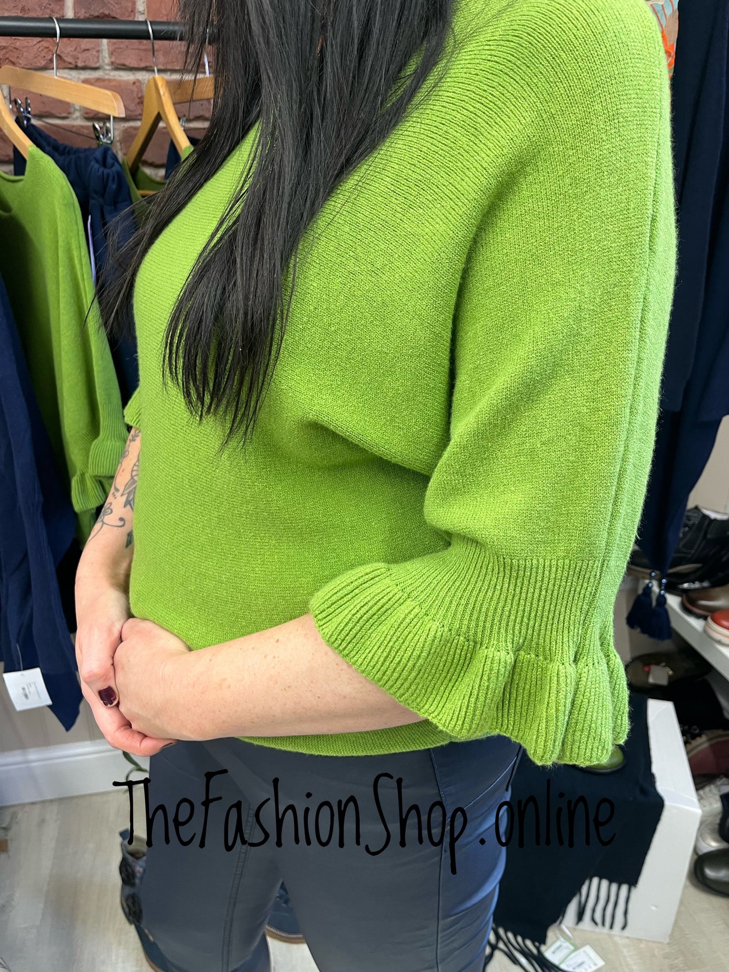 Tess green jumper with frill sleeve 8-14