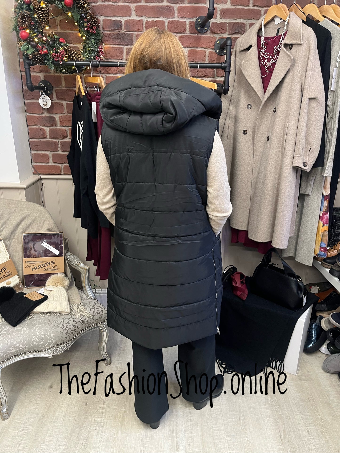 Black longline padded gilet in sizes 8 to 18