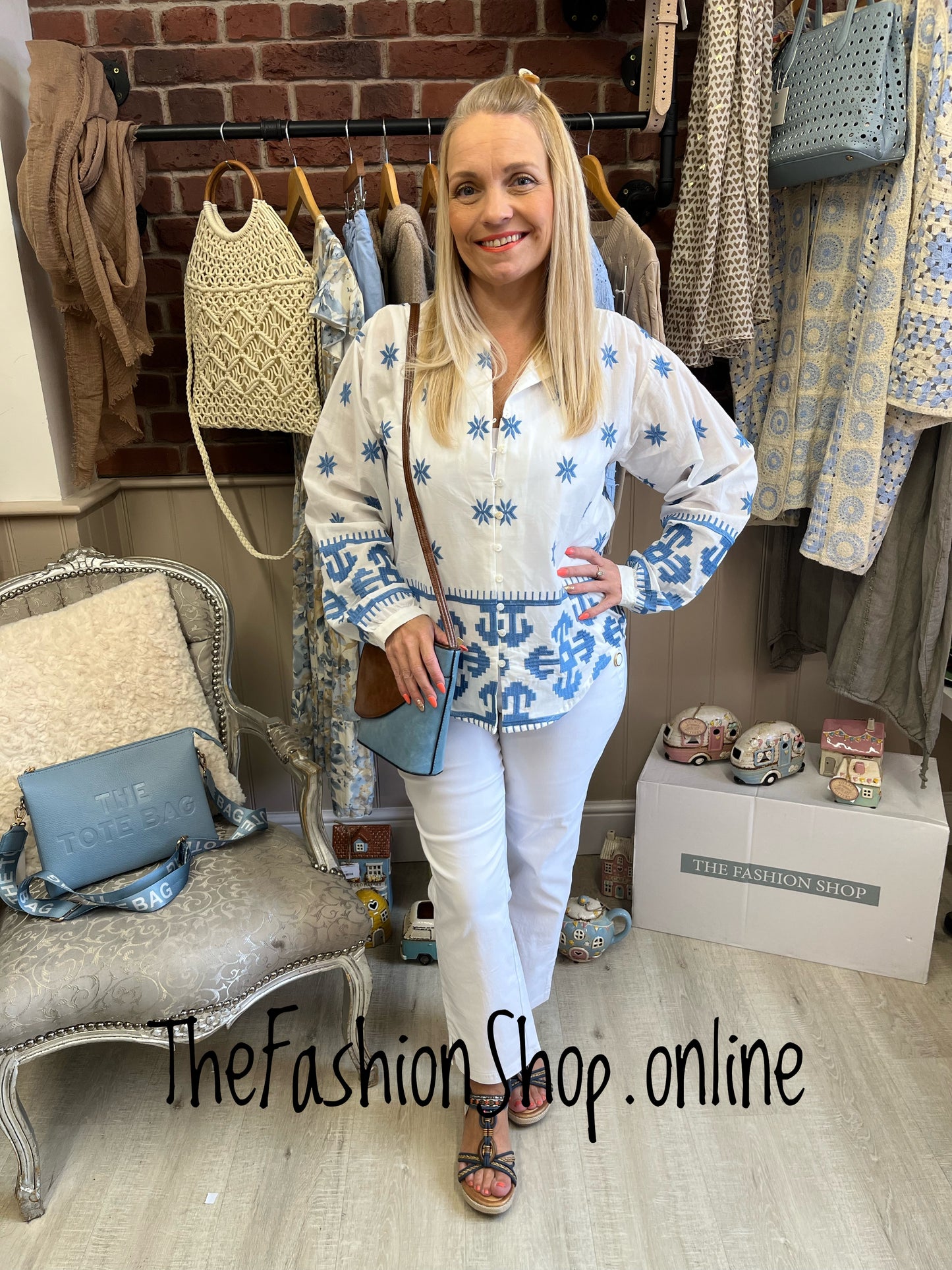 Bella blue and white embroidered blouse 10-12