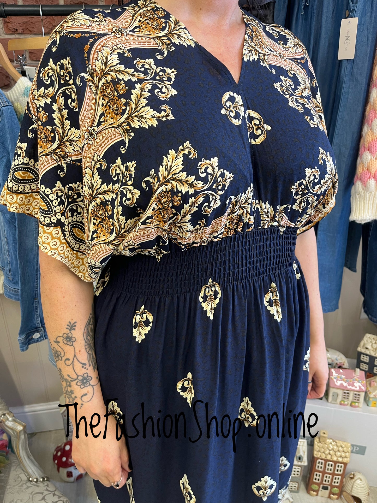 Maria navy and gold dress sizes 10-12, 14-16 and 18