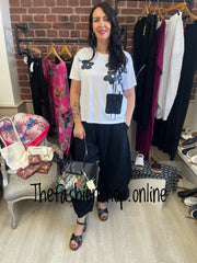 Fly Out white and black flower top 10-16