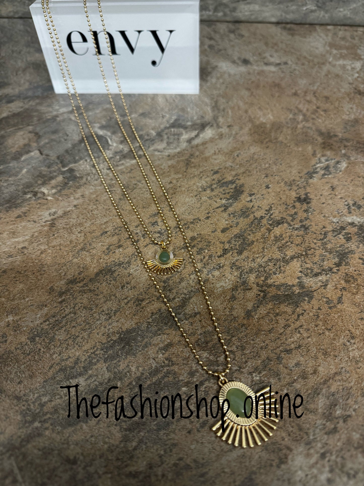 Envy long gold fan necklace with green stones