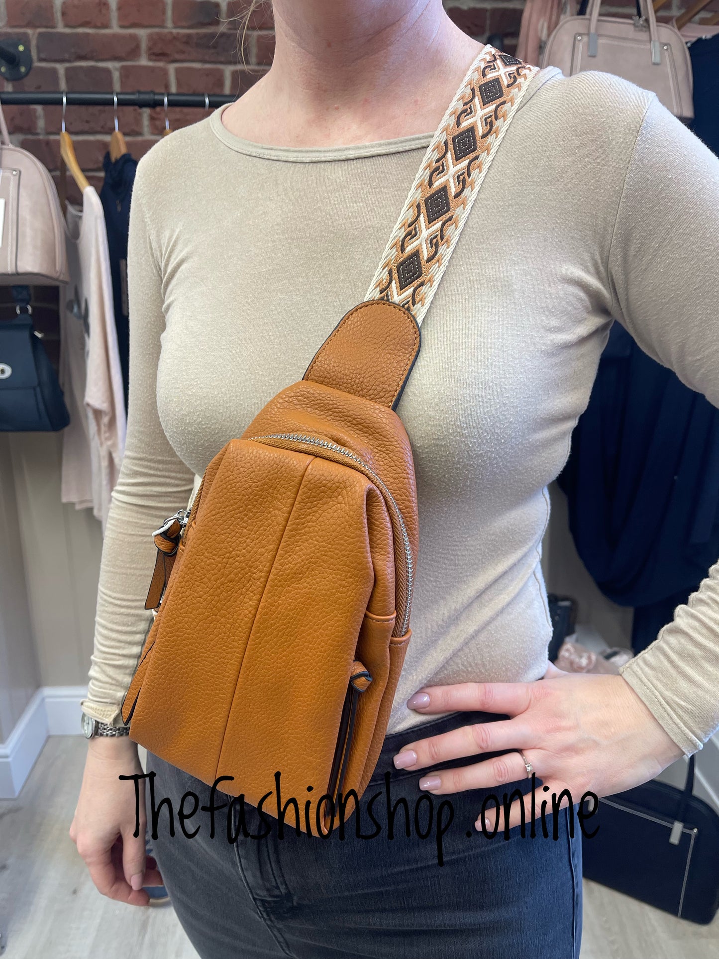 Tan faux leather sling bag