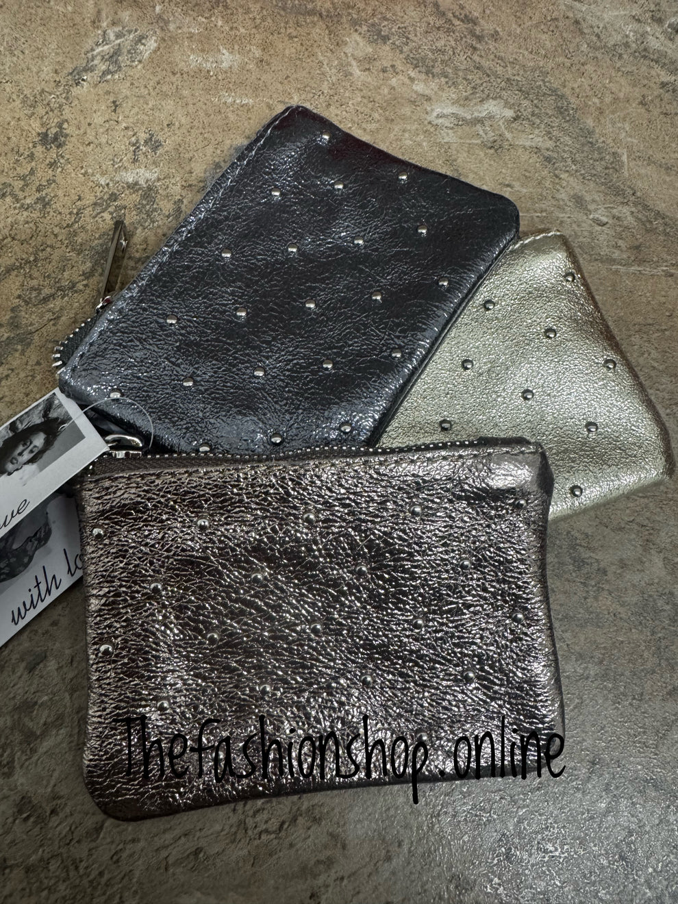 Leather studded bronze purse