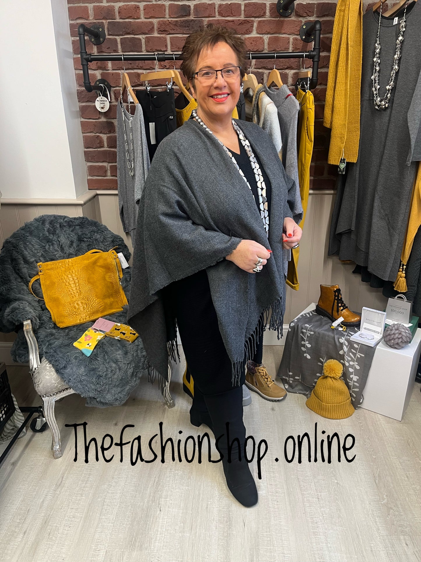 Charcoal grey knitted fringe cape- free size