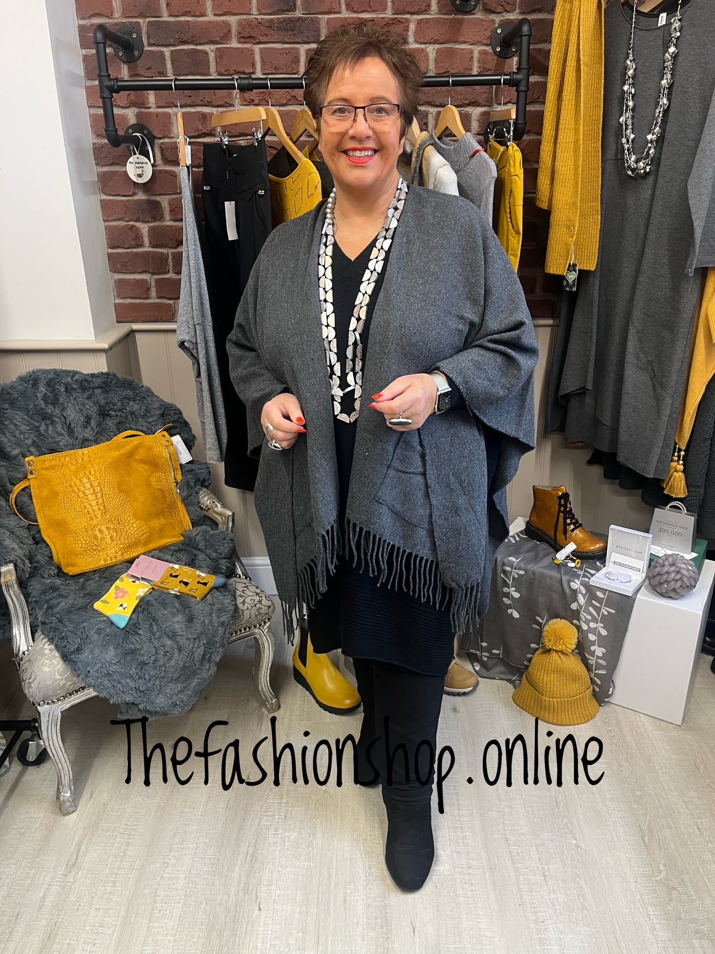 Charcoal grey knitted fringe cape- free size