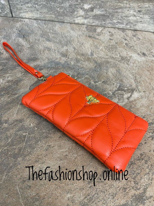 Orange leather quilted clutch