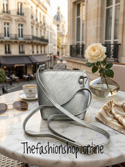 Silver chic bag with long shoulder strap