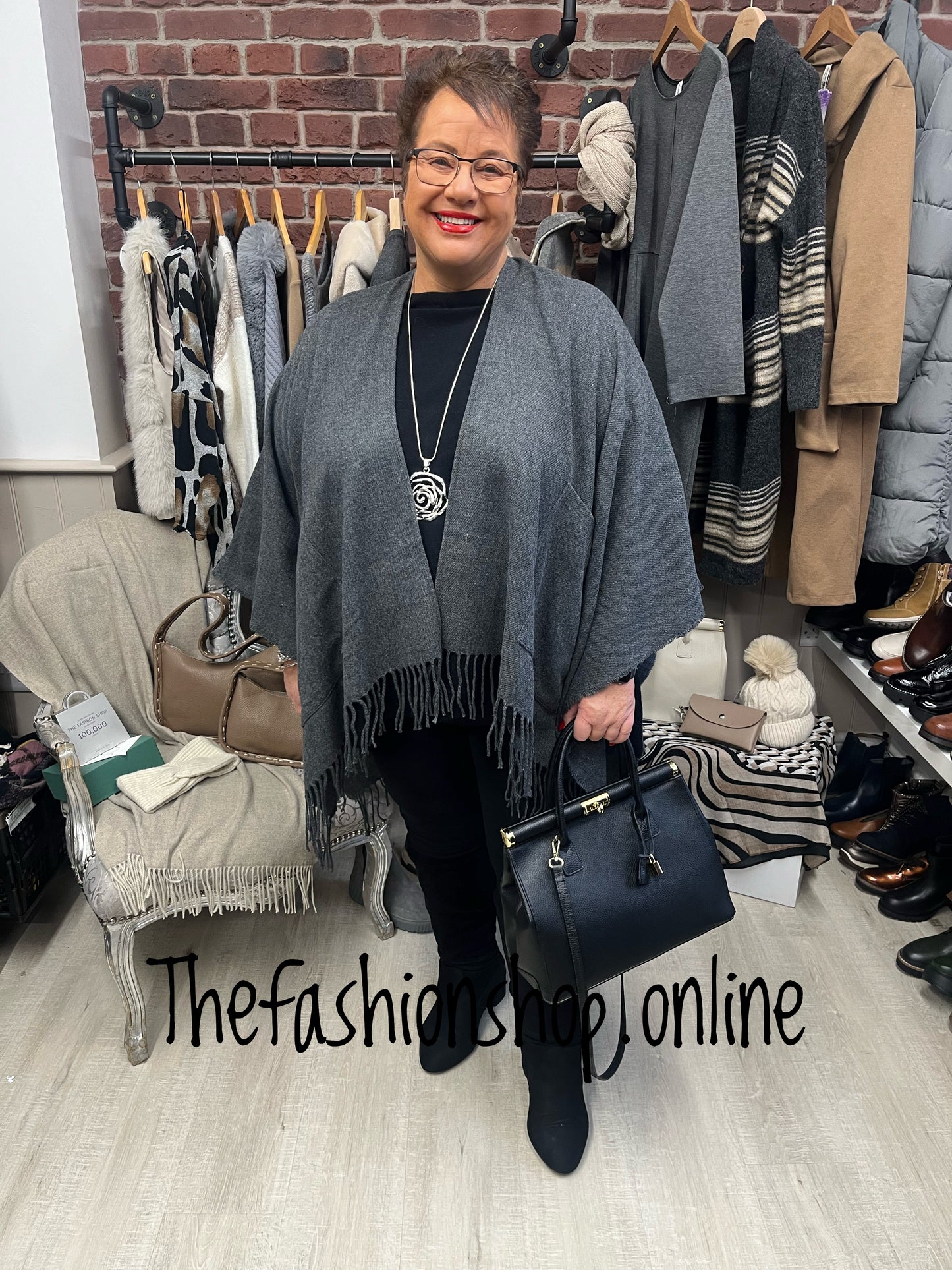 Charcoal grey knitted fringe cape- free size