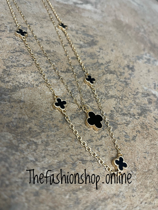 Envy layered gold necklace with black clovers