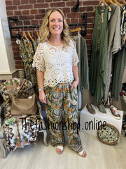 Naomi leaf border print trousers sizes 12, 14 and 16