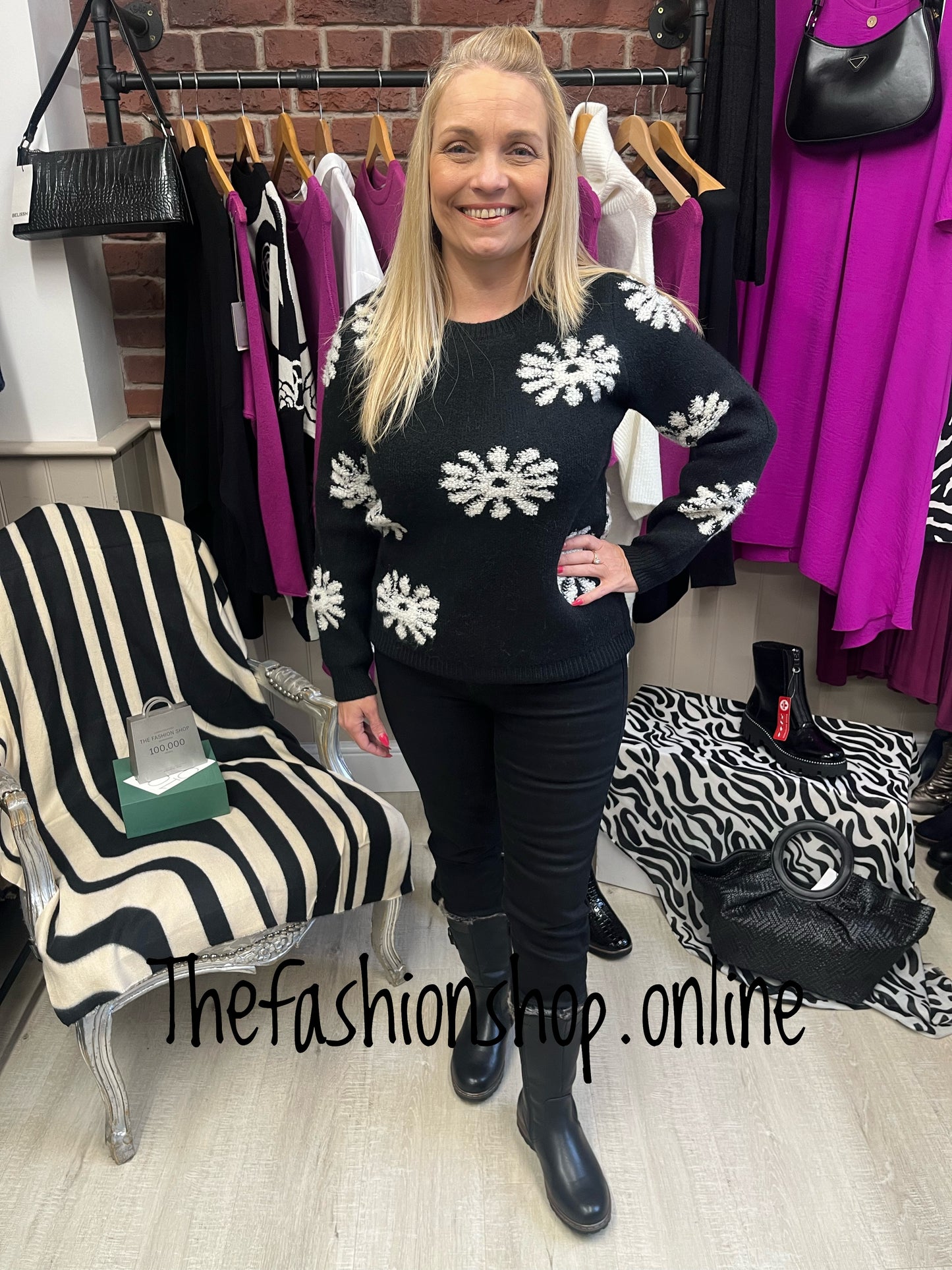 Tina black floral jumper sizes 10, 12, 14 and 16