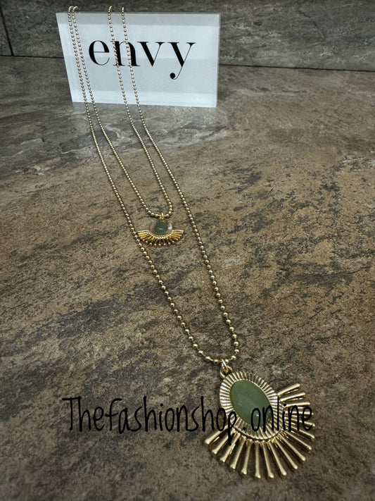 Envy long gold fan necklace with green stones