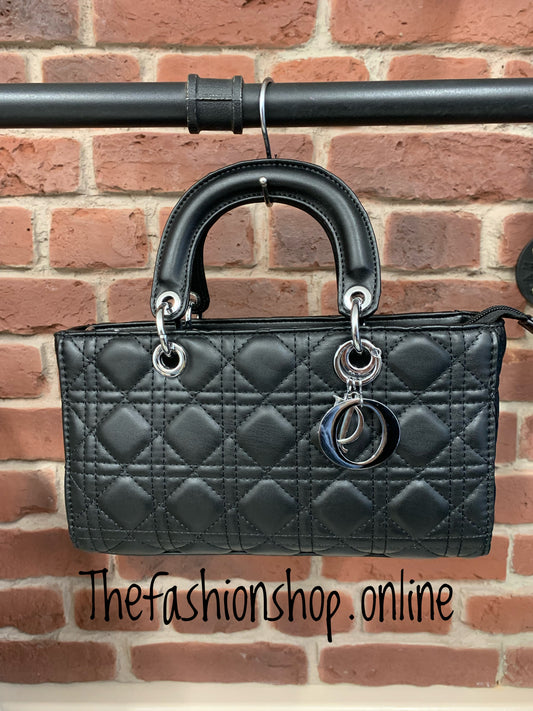 Black quilted oblong bag
