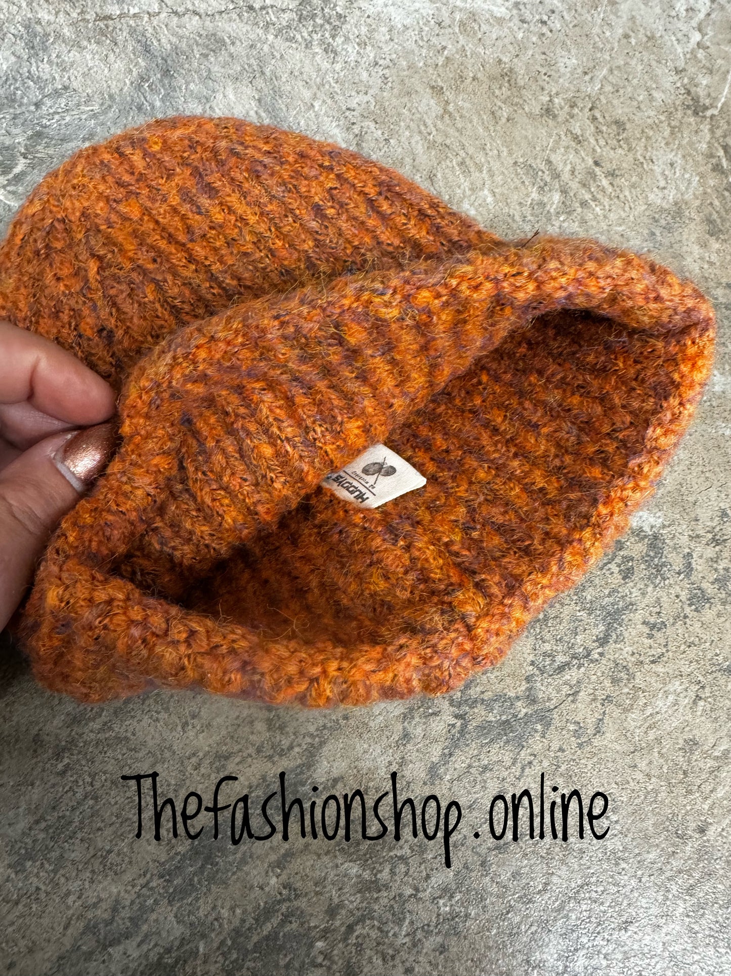 Huddy's rust orange flecked beanie hat