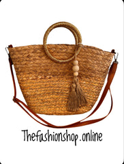 Opulent Gold handle woven straw bag