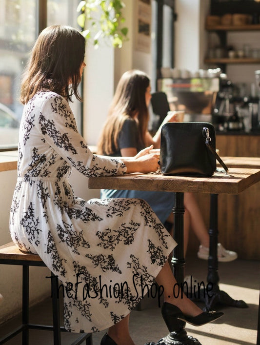 Black chic bag with long shoulder strap