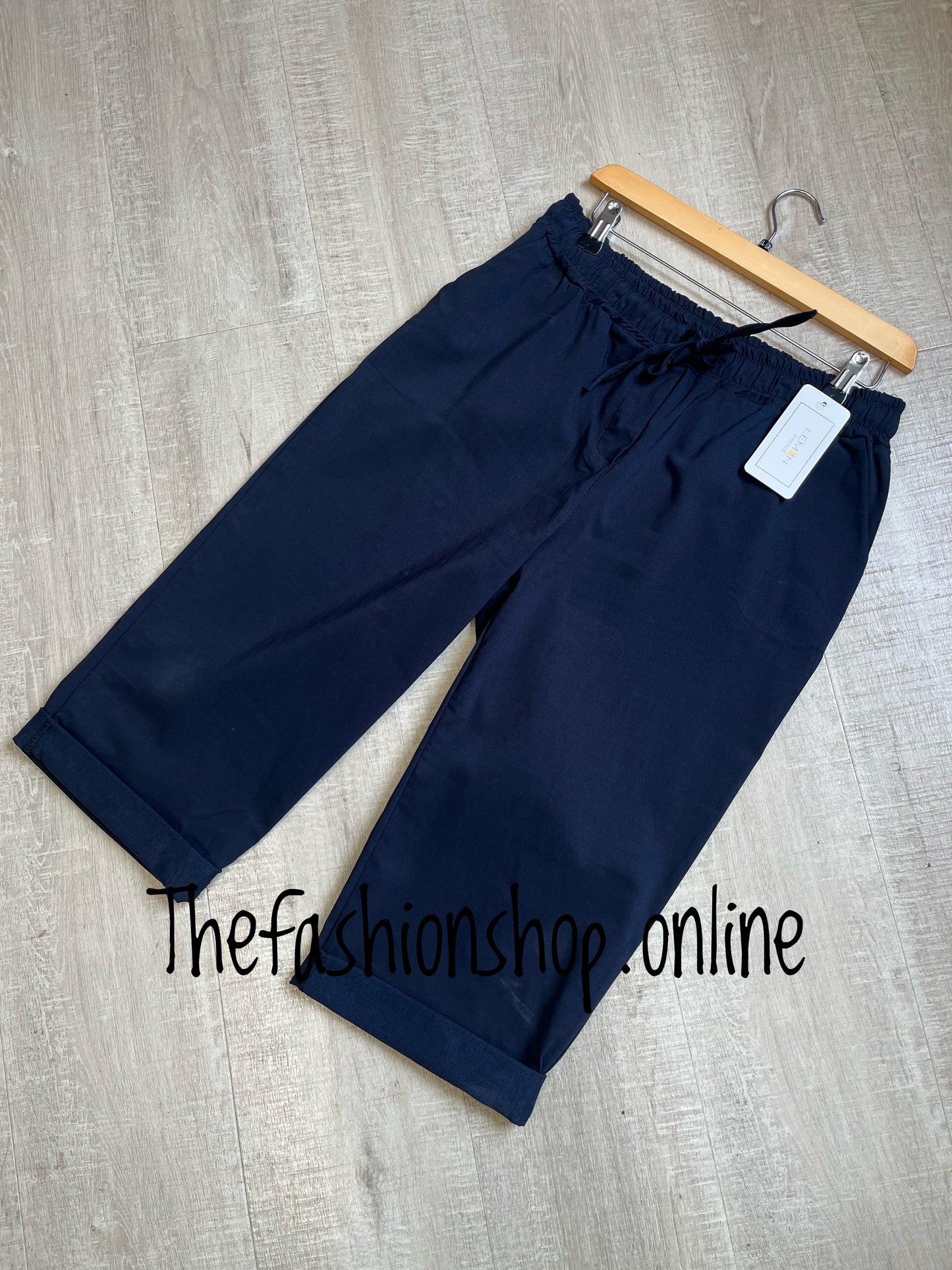 Navy stretchy cropped trousers sizes 10-14 and 16-20
