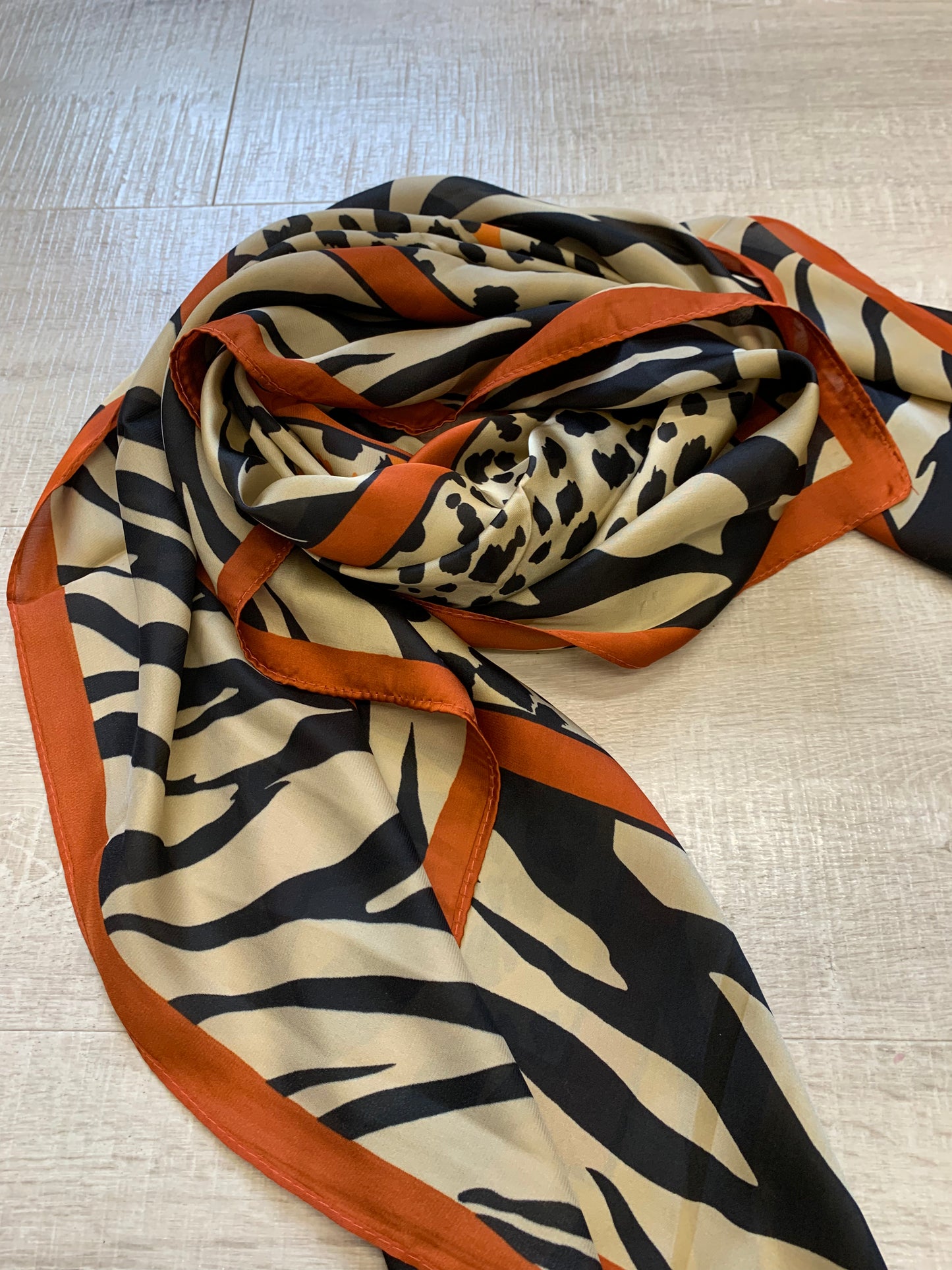 Rust and beige animal print silky square scarf